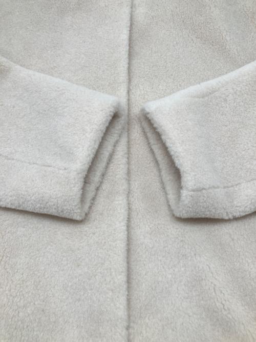 M-premierBLACK（エムプルミエブラック）M-premierBLACK (エムプルミエブラック) フェイクファーノーカラーコート　2025モデル ホワイト サイズ:38の古着・服飾アイテム