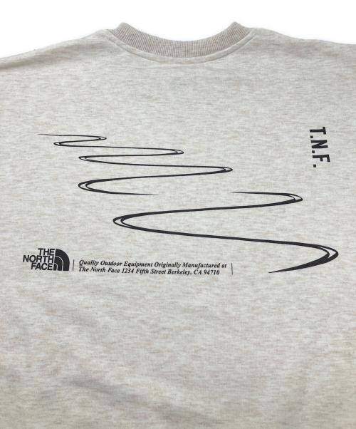THE NORTH FACE（ザ ノース フェイス）THE NORTH FACE (ザ ノース フェイス) クルーネックスウェット　GRAPHIC SWEAT CREW アイボリー サイズ:Ｓの古着・服飾アイテム