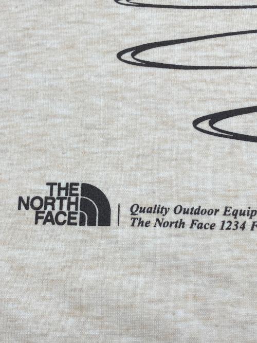 THE NORTH FACE（ザ ノース フェイス）THE NORTH FACE (ザ ノース フェイス) クルーネックスウェット　GRAPHIC SWEAT CREW アイボリー サイズ:Ｓの古着・服飾アイテム