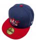 New Era（ニューエラ）の古着「キャップ」｜ネイビー×レッド
