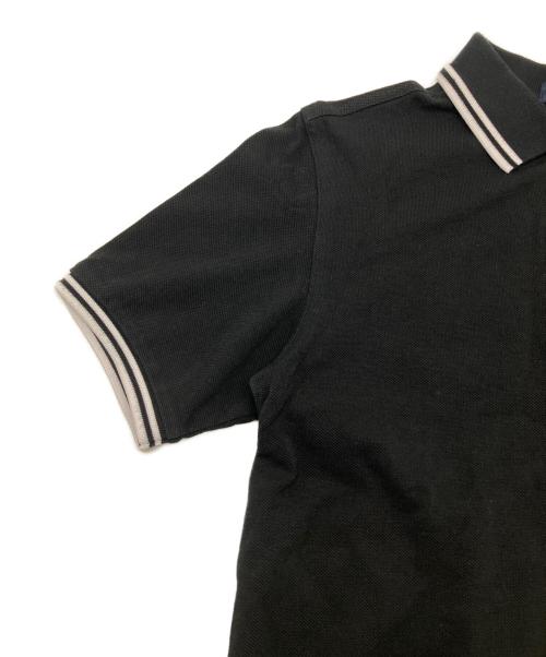FRED PERRY（フレッドペリー）FRED PERRY (フレッドペリー) 半袖ポロシャツ ブラック×ホワイト サイズ:36の古着・服飾アイテム
