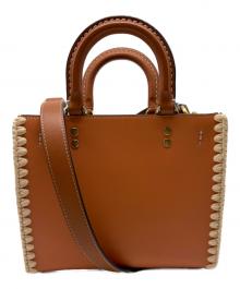 COACH（コーチ）の古着「ローグ20・クロシェ」｜ブラウン×ネイビー