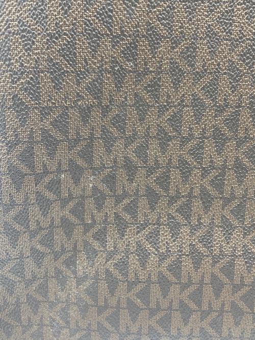 MICHAEL KORS（マイケルコース）MICHAEL KORS (マイケルコース) デイパック ブラウンの古着・服飾アイテム