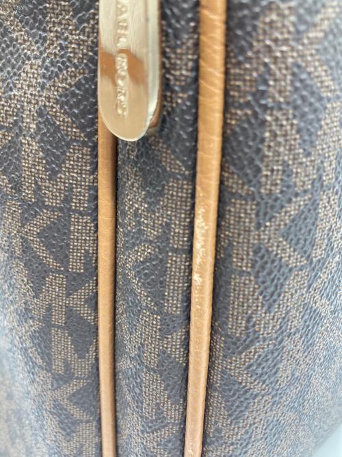 MICHAEL KORS（マイケルコース）MICHAEL KORS (マイケルコース) デイパック ブラウンの古着・服飾アイテム