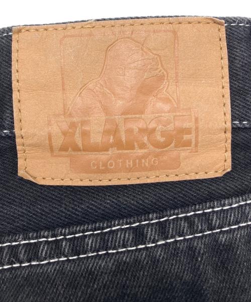 X-LARGE（エクストララージ）X-LARGE (エクストララージ) デニムパンツ　BURNING DICE PANTS ブラック サイズ:W32の古着・服飾アイテム