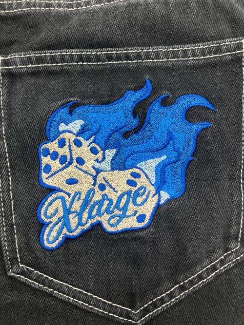 X-LARGE（エクストララージ）X-LARGE (エクストララージ) デニムパンツ　BURNING DICE PANTS ブラック サイズ:W32の古着・服飾アイテム