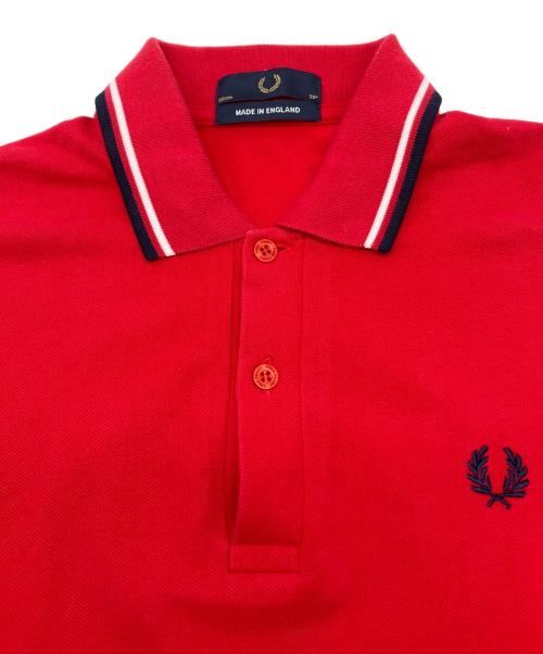 FRED PERRY（フレッドペリー）FRED PERRY (フレッドペリー) ポロシャツ レッド×ネイビー サイズ:38の古着・服飾アイテム