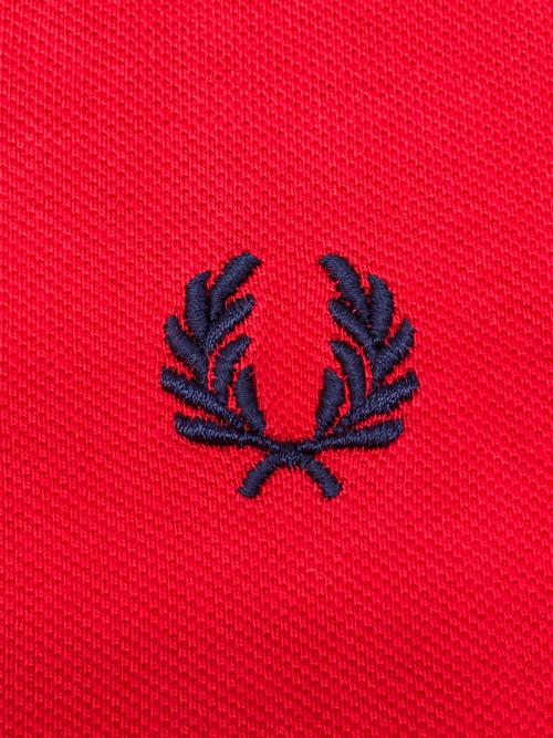 FRED PERRY（フレッドペリー）FRED PERRY (フレッドペリー) ポロシャツ レッド×ネイビー サイズ:38の古着・服飾アイテム