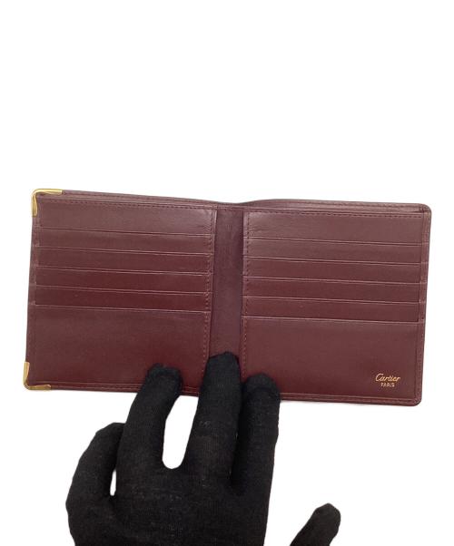 Cartier（カルティエ）Cartier (カルティエ) 札入れ ワインレッドの古着・服飾アイテム