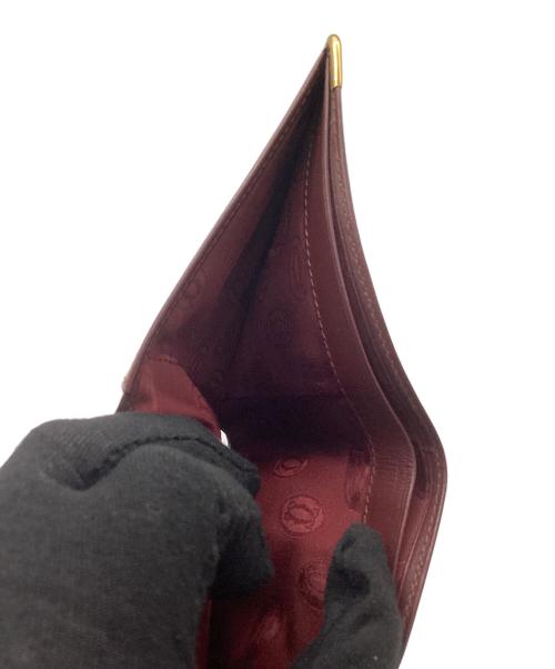 Cartier（カルティエ）Cartier (カルティエ) 札入れ ワインレッドの古着・服飾アイテム