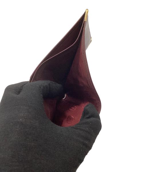 Cartier（カルティエ）Cartier (カルティエ) 札入れ ワインレッドの古着・服飾アイテム