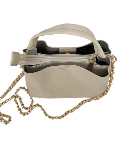 M'S GRACY（エムズグレイシー）M'S GRACY (エムズグレイシー) カメリアパンチングバッグ ベージュの古着・服飾アイテム