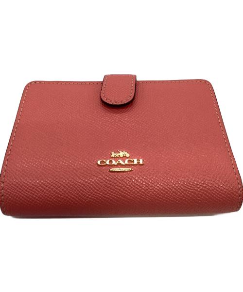 COACH（コーチ）COACH (コーチ) 2つ折り財布 ピンクの古着・服飾アイテム