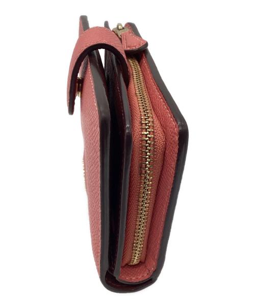 COACH（コーチ）COACH (コーチ) 2つ折り財布 ピンクの古着・服飾アイテム