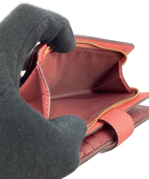 COACH（コーチ）COACH (コーチ) 2つ折り財布 ピンクの古着・服飾アイテム