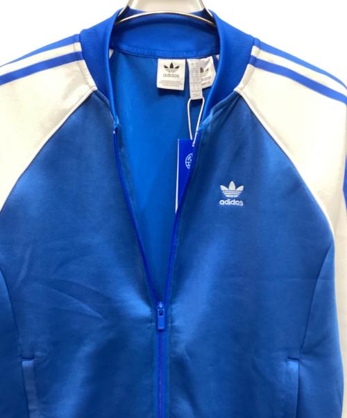adidas（アディダス）adidas (アディダス) アディカラー クラシックス オーバーサイズ SST トラックトップ ブルー サイズ:Ｓの古着・服飾アイテム
