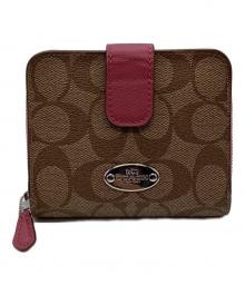 COACH（コーチ）の古着「2つ折り財布」｜ピンク