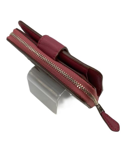 COACH（コーチ）COACH (コーチ) 2つ折り財布 ピンクの古着・服飾アイテム