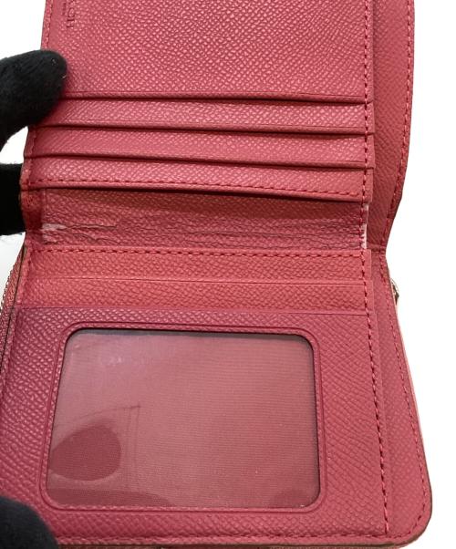 COACH（コーチ）COACH (コーチ) 2つ折り財布 ピンクの古着・服飾アイテム