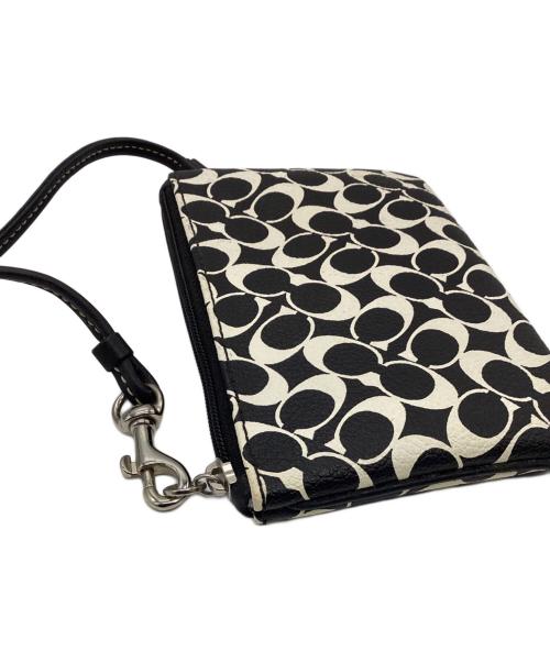 COACH（コーチ）COACH (コーチ) ポーチ ホワイト×ブラックの古着・服飾アイテム