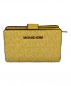 MICHAEL KORSマイケル・コース）の古着「2つ折り財布」｜イエロー