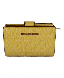 MICHAEL KORS（マイケル・コース）の古着「2つ折り財布」｜イエロー