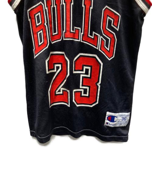 NBA（エヌビーエー）NBA (エヌビーエー) Champion (チャンピオン) シカゴブルズ JORDAN 23 ゲームシャツ ブラック×レッド サイズ:36の古着・服飾アイテム