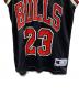 中古・古着 NBA (エヌビーエー) Champion (チャンピオン) シカゴブルズ JORDAN 23 ゲームシャツ ブラック×レッド サイズ:36：5000円