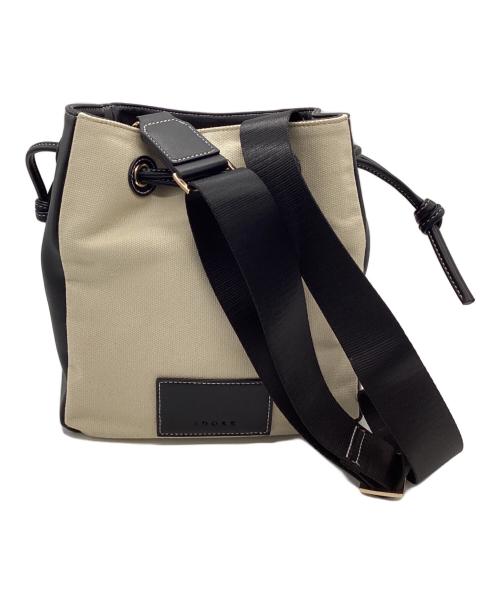 ADORE（アドーア）ADORE (アドーア) ドロストバケットバッグ ベージュ×ブラックの古着・服飾アイテム