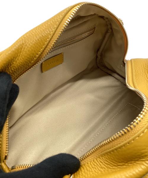 STORY.（ストーリー）STORY. (ストーリー) スクエアレザーバッグ イエローの古着・服飾アイテム