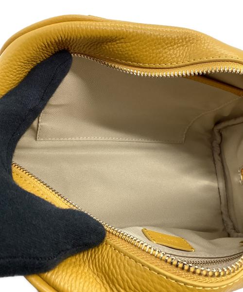 STORY.（ストーリー）STORY. (ストーリー) スクエアレザーバッグ イエローの古着・服飾アイテム