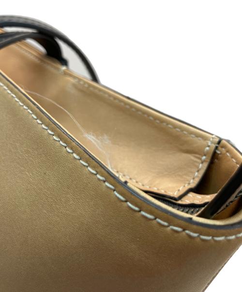 TUMI（トゥミ）TUMI (トゥミ) レザートートバッグ ブラウンの古着・服飾アイテム