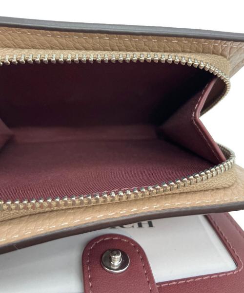 COACH（コーチ）COACH (コーチ) スナップ ウォレット・コーチ ヘリテージ ベージュの古着・服飾アイテム
