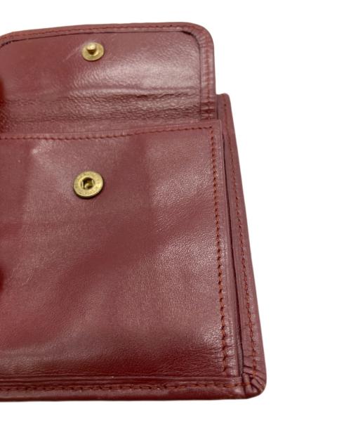 Cartier（カルティエ）Cartier (カルティエ) マストライン 2つ折り財布 ボルドーの古着・服飾アイテム
