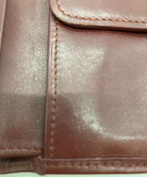 Cartier（カルティエ）Cartier (カルティエ) マストライン 2つ折り財布 ボルドーの古着・服飾アイテム