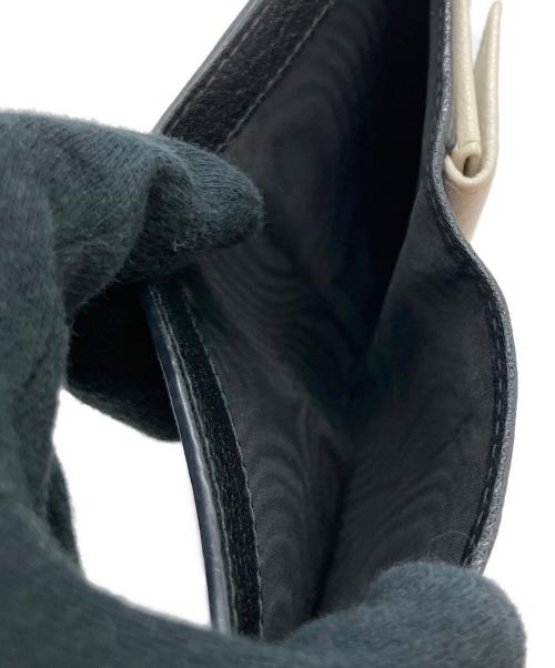 MIU MIU（ミュウミュウ）MIU MIU (ミュウミュウ) 2つ折り財布 ブラック×ホワイトの古着・服飾アイテム