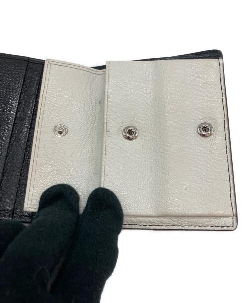 MIU MIU（ミュウミュウ）MIU MIU (ミュウミュウ) 2つ折り財布 ブラック×ホワイトの古着・服飾アイテム