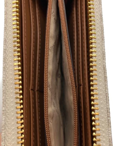 MICHAEL KORS（マイケル・コース）MICHAEL KORS (マイケル・コース) コーテッドキャンバス 長財布 ホワイトの古着・服飾アイテム
