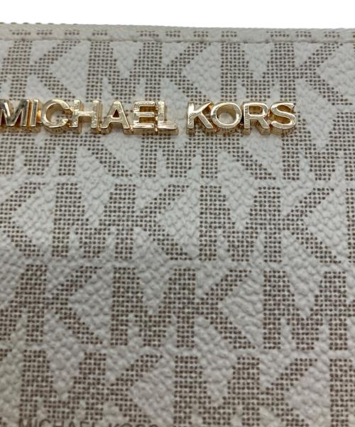 MICHAEL KORS（マイケル・コース）MICHAEL KORS (マイケル・コース) コーテッドキャンバス 長財布 ホワイトの古着・服飾アイテム
