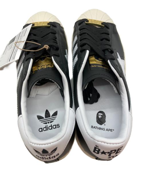 adidas（アディダス）adidas (アディダス) A BATHING APE (ア ベイシング エイプ) スーパースター ローカットスニーカー ブラック×ホワイト サイズ:22cm 未使用品の古着・服飾アイテム