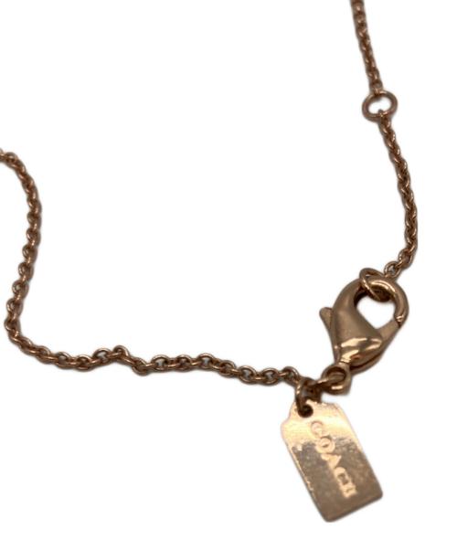 COACH（コーチ）COACH (コーチ) アーチストーンネックレス ピンクゴールドの古着・服飾アイテム