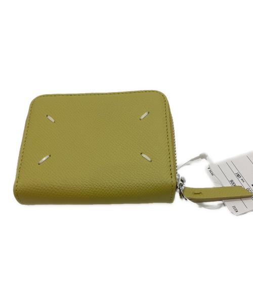 Maison Margiela（メゾンマルジェラ）Maison Margiela (メゾンマルジェラ) 4ステッチジップアラウンドコンパクトウォレット イエローの古着・服飾アイテム