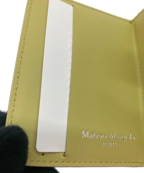 Maison Margiela（メゾンマルジェラ）Maison Margiela (メゾンマルジェラ) 4ステッチジップアラウンドコンパクトウォレット イエローの古着・服飾アイテム