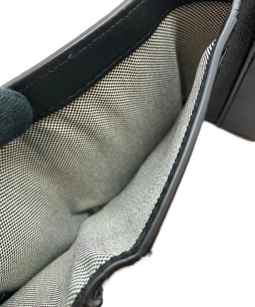 COLE HAAN（コールハーン）COLE HAAN (コールハーン) 3つ折り財布 ブラック×ホワイトの古着・服飾アイテム