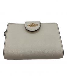 COACH（コーチ）の古着「ミディアムコーナージップウォレット 2つ折り財布」｜アイボリー