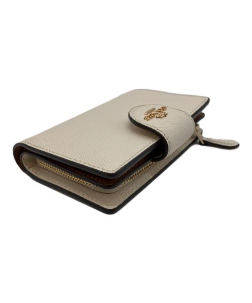 COACH（コーチ）COACH (コーチ) ミディアムコーナージップウォレット 2つ折り財布 アイボリーの古着・服飾アイテム
