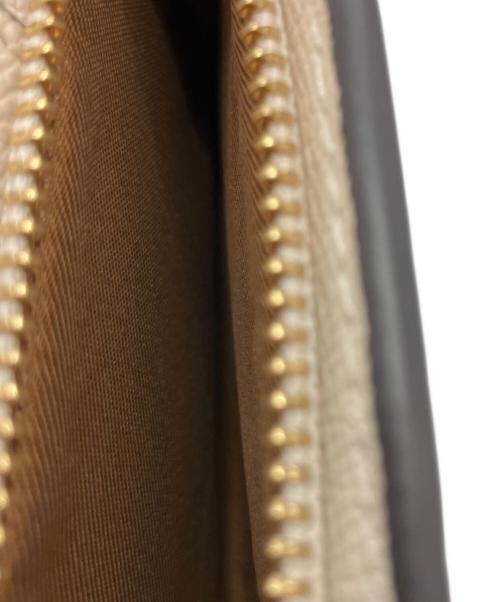 COACH（コーチ）COACH (コーチ) ミディアムコーナージップウォレット 2つ折り財布 アイボリーの古着・服飾アイテム