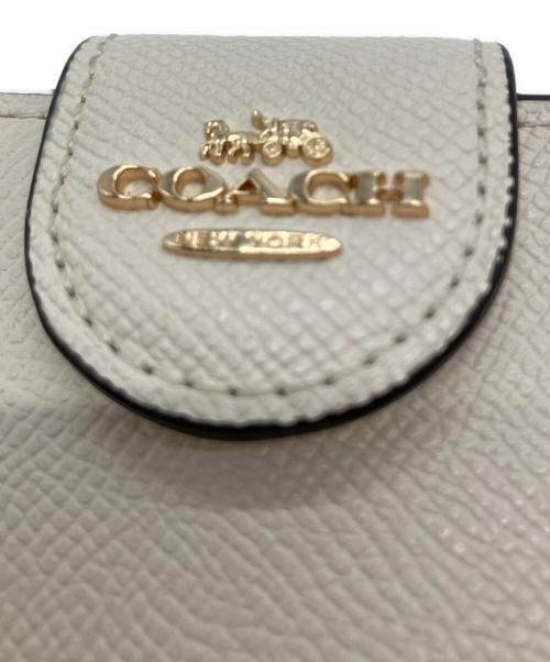 COACH（コーチ）COACH (コーチ) ミディアムコーナージップウォレット 2つ折り財布 アイボリーの古着・服飾アイテム