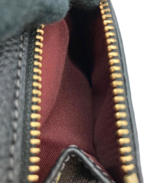 COACH（コーチ）COACH (コーチ) 花柄 2つ折り財布 ブラックの古着・服飾アイテム