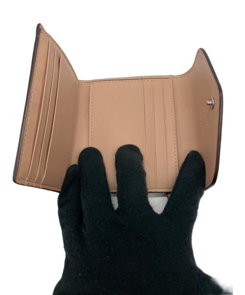 COACH（コーチ）COACH (コーチ) 3つ折り財布 ベージュの古着・服飾アイテム